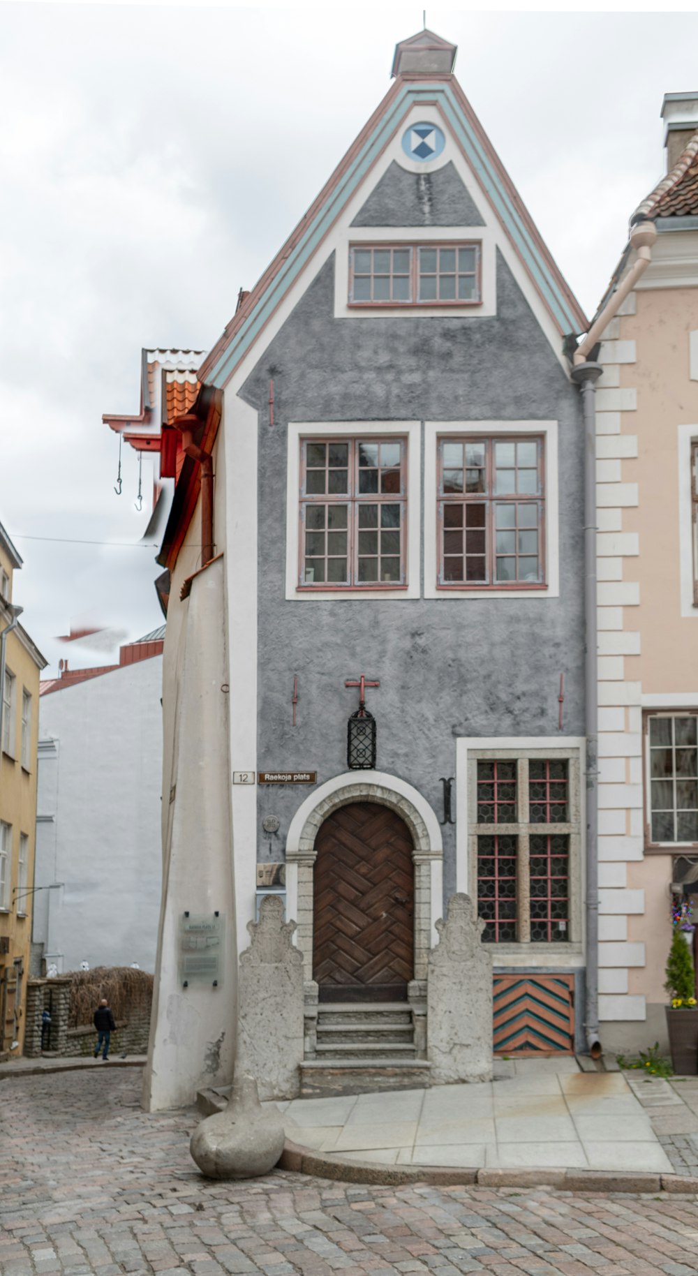 a building with a clock on the front of it