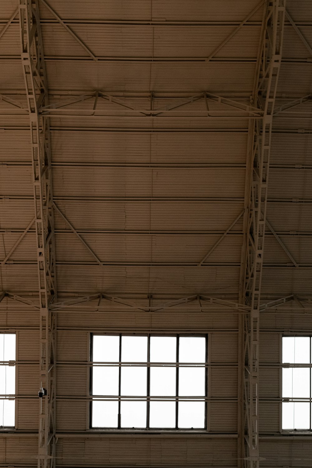 a large open room with a clock on the wall