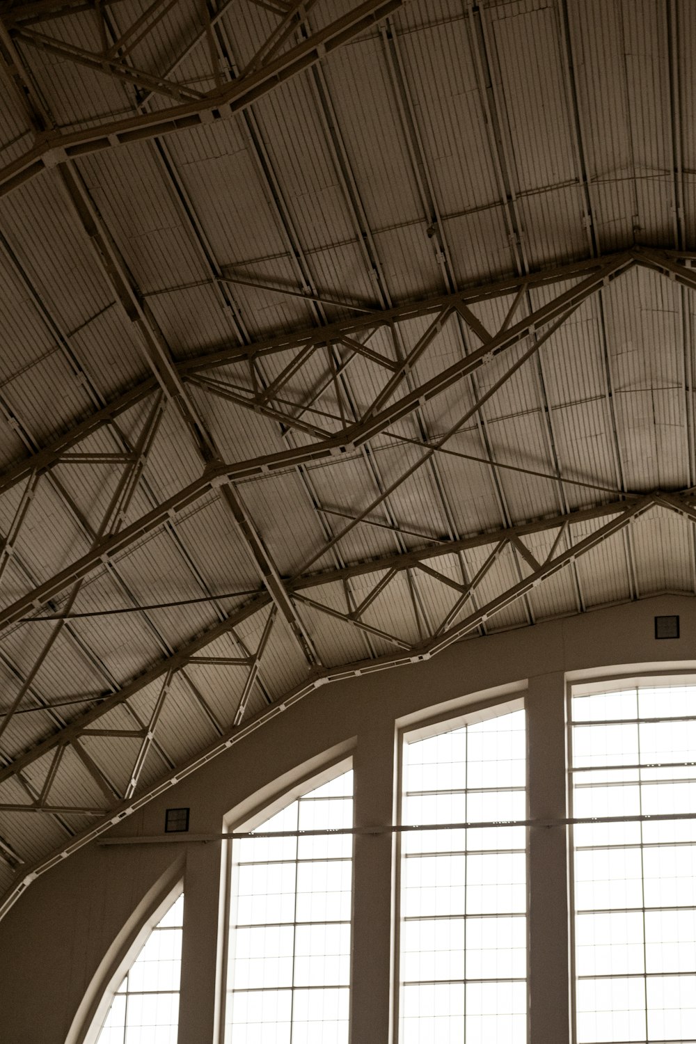 a large open room with a clock on the wall