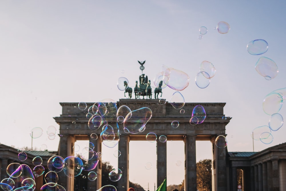 a bunch of soap bubbles floating in the air