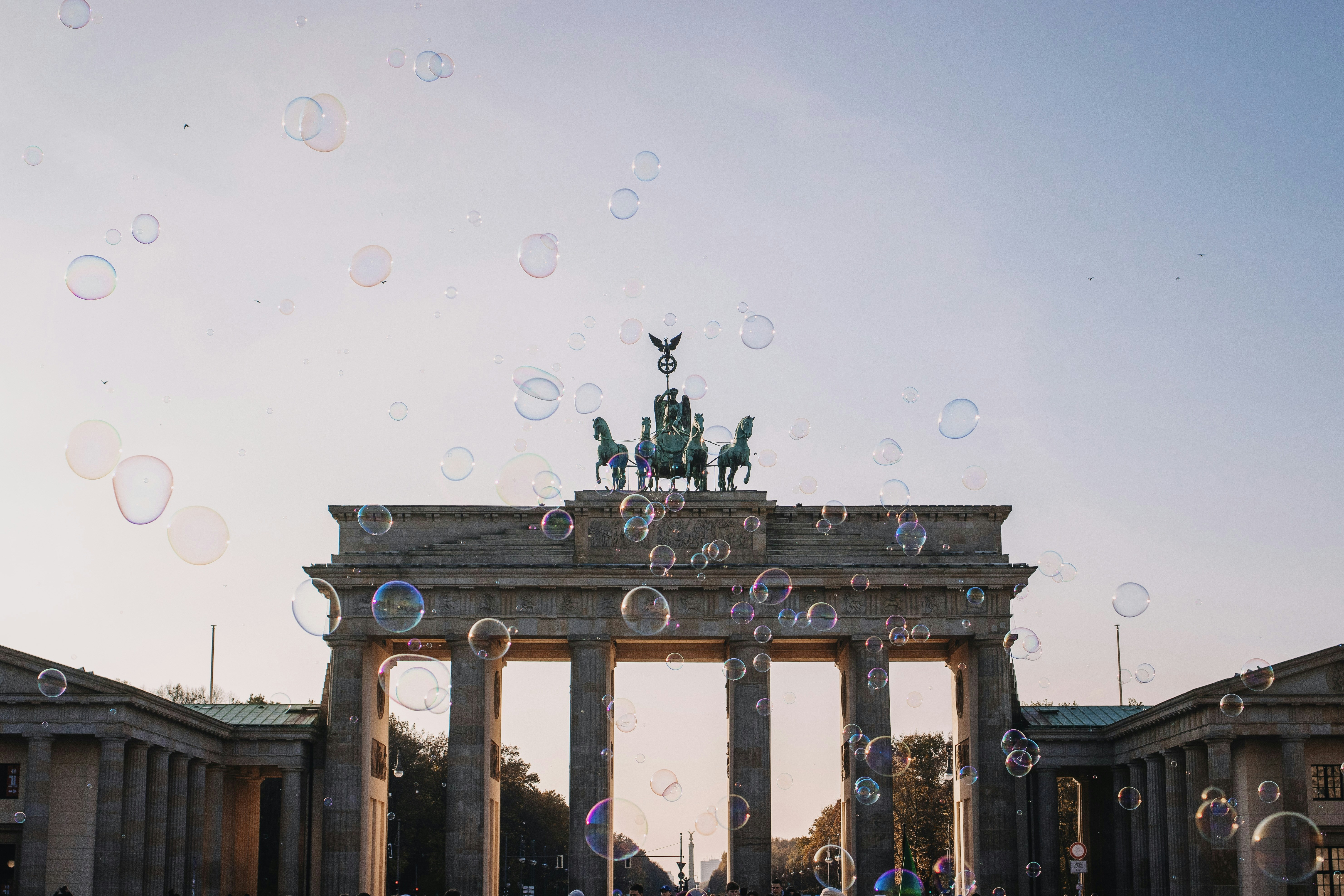 a group of people standing in front of a building