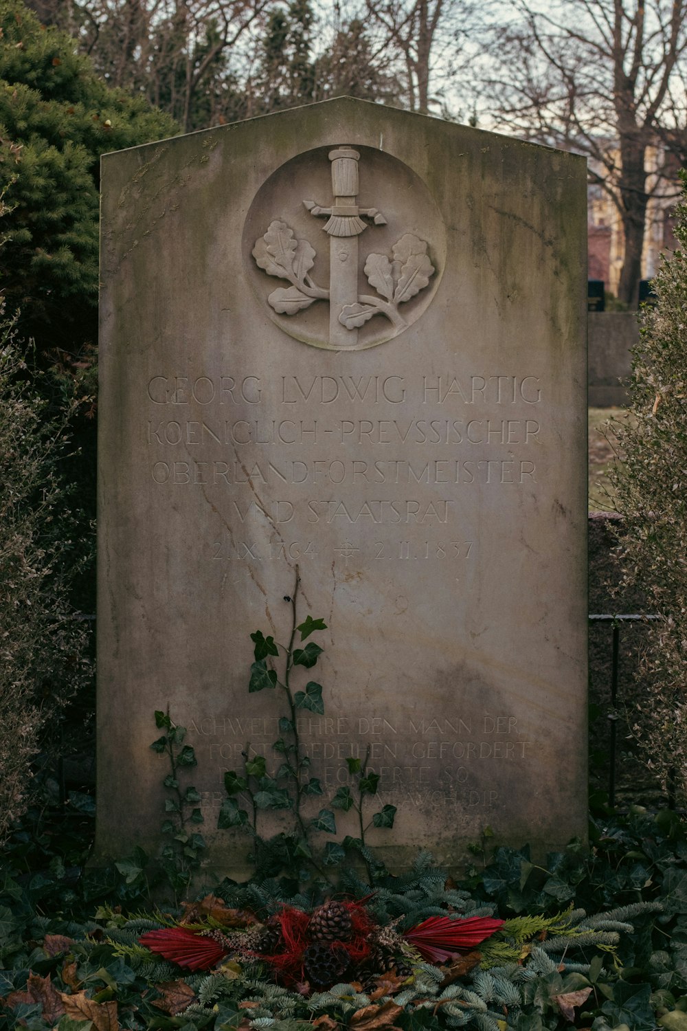 a grave with a cross on top of it