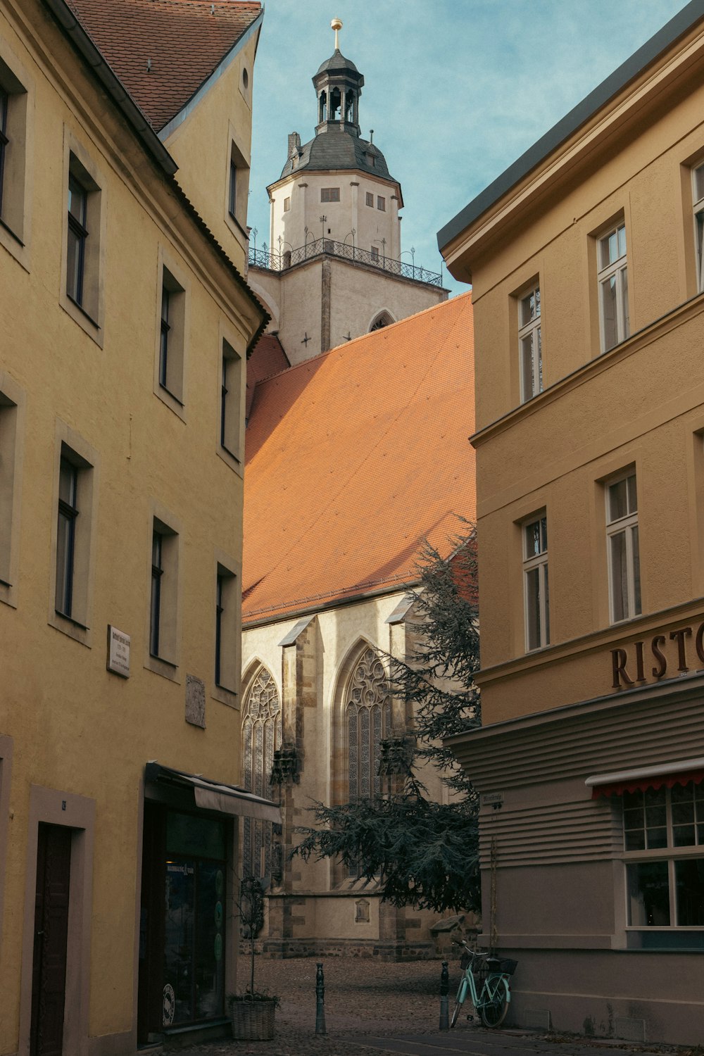 a tall building with a clock tower on top of it