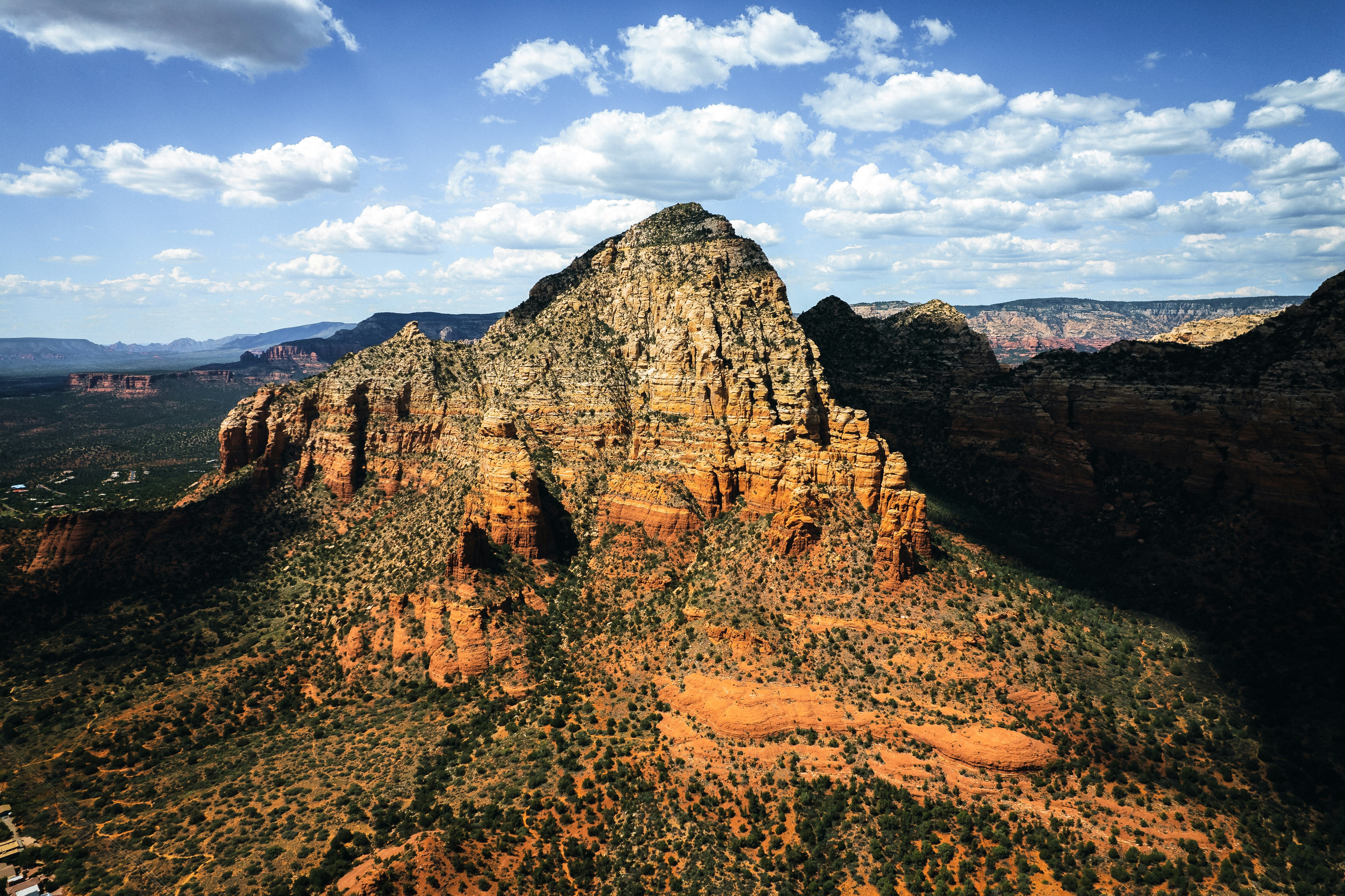 a view of a mountain with a sky background