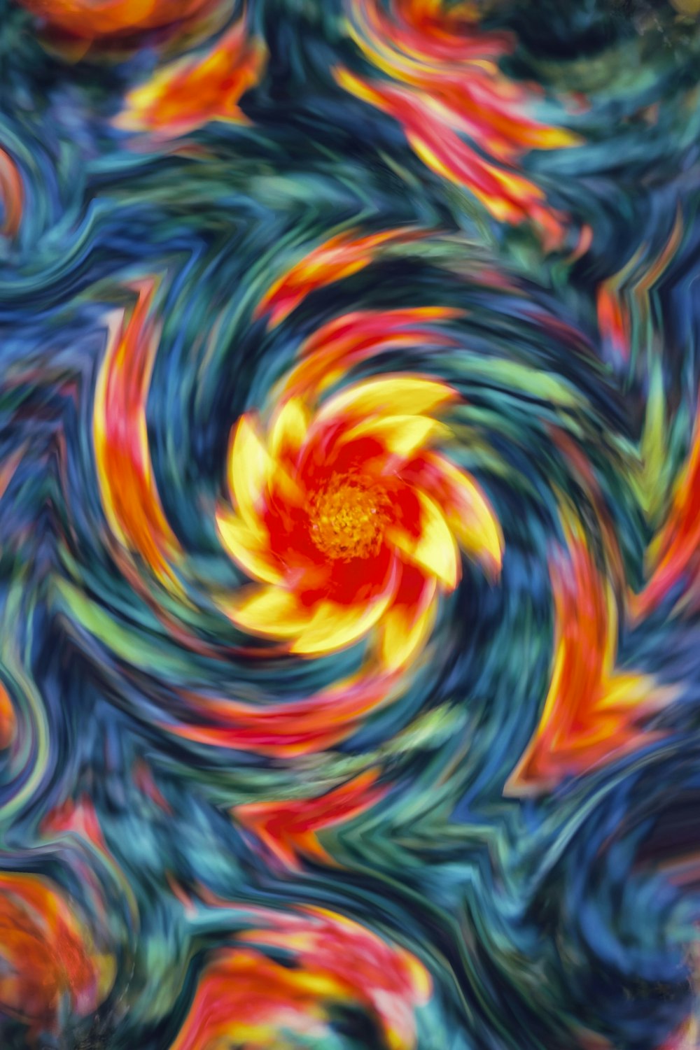 a red and yellow flower surrounded by blue and green swirls