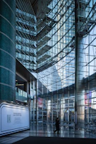A showroom interior featuring custom aluminium cladding elements and glass partitions.