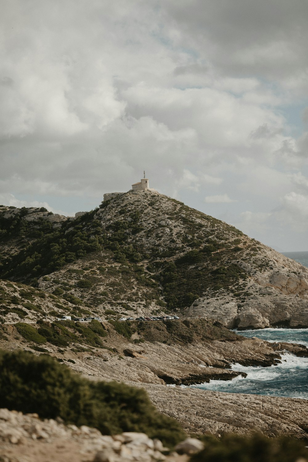 a hill that has a tower on top of it