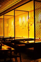 A cozy dining area with Indian decor reminiscent of the Taj Mahal.