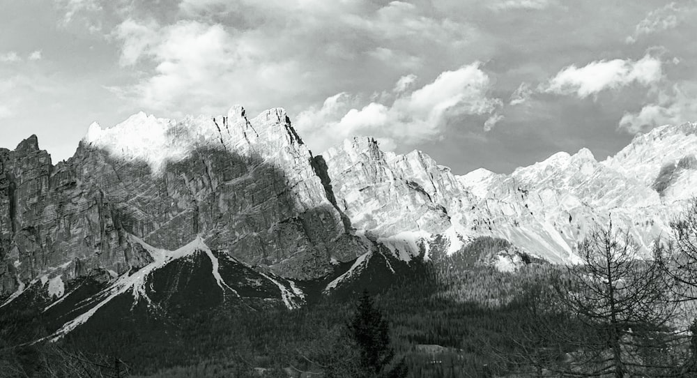 a black and white photo of a mountain range