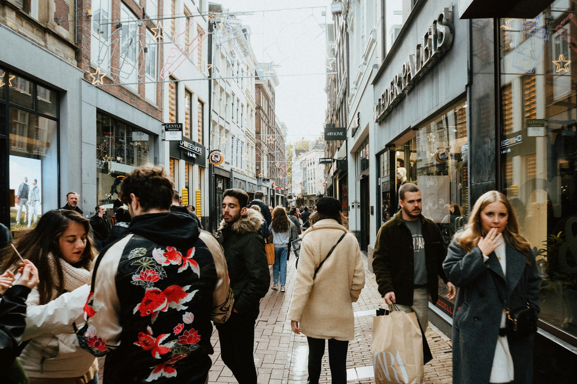 woman wearing yellow long-sleeved dress under white clouds and blue sky during daytime