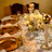 Luxurious banquet table with modern furniture and delicate golden accents.