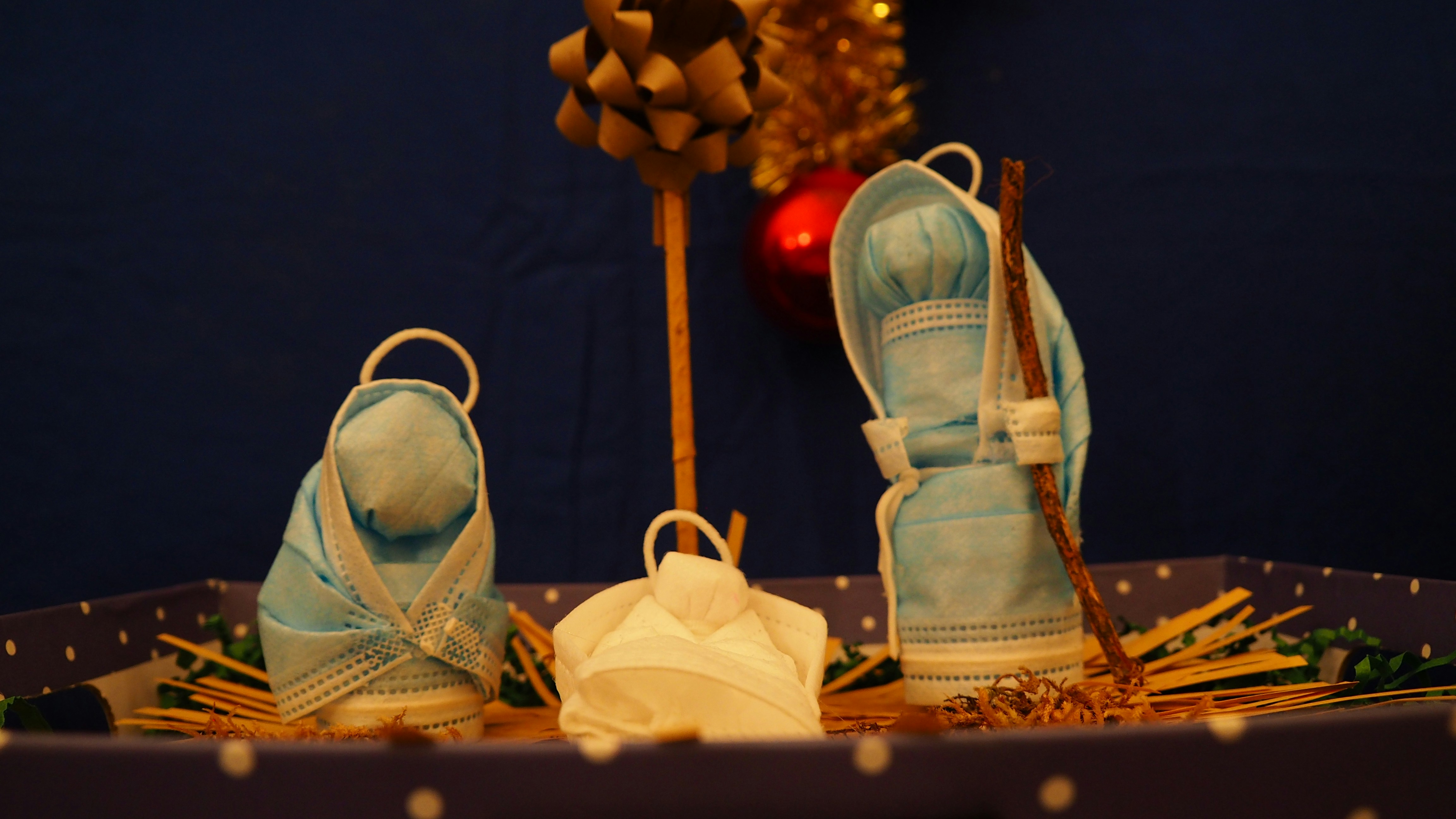 a pair of baby blue shoes sitting on top of a table