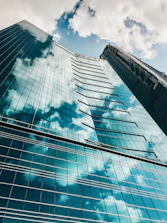 A sparkling clean commercial building window reflecting the blue sky.