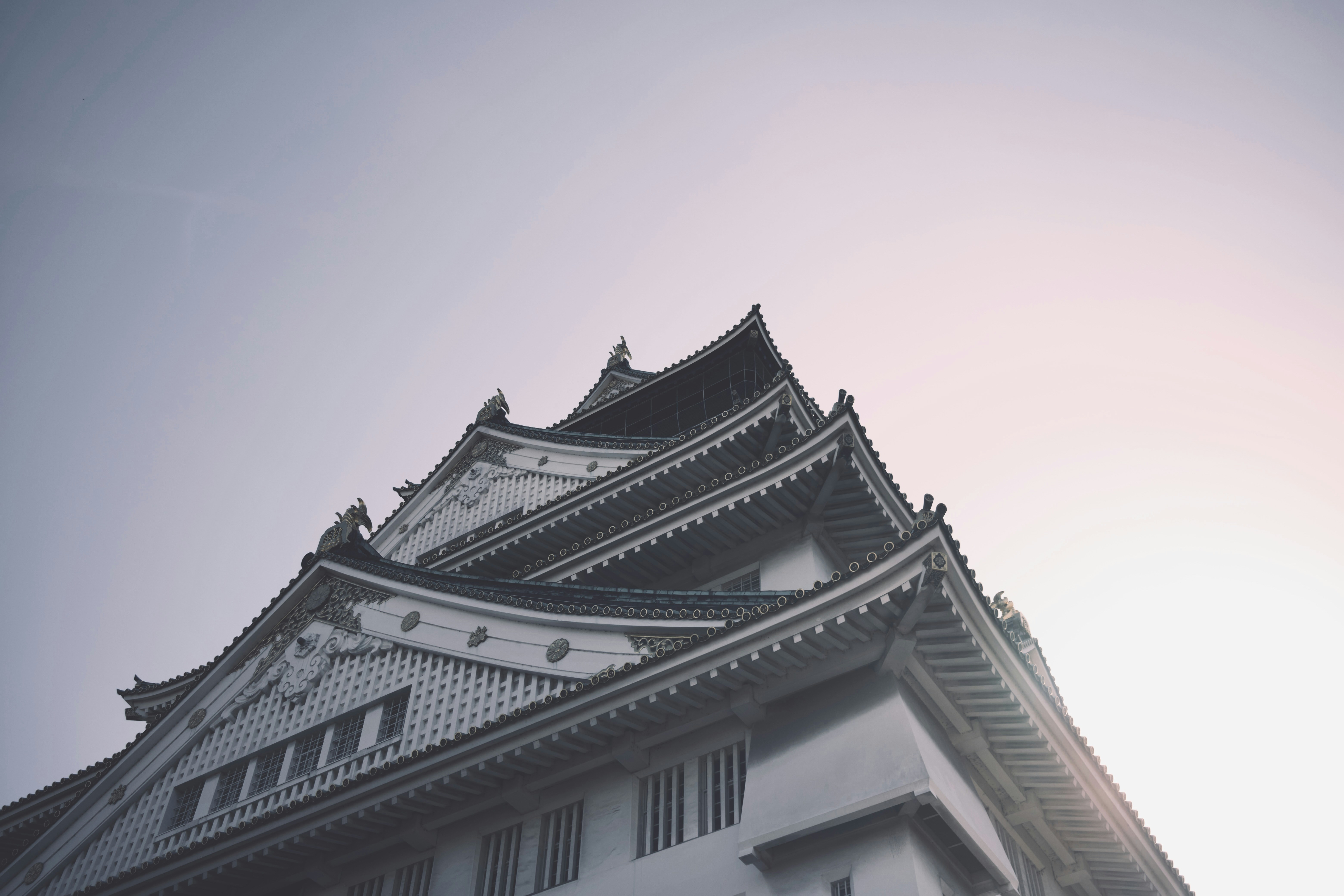 a tall building with a clock on the top of it