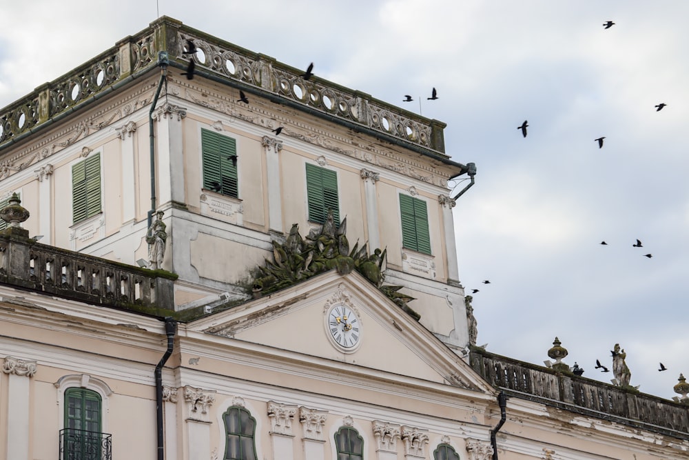 a large building with a clock on the top of it