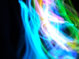 A dynamic display of glowing digital art representing creativity.