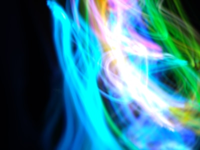 A dynamic music demo visual with colorful sound bars pulsing rhythmically on a dark canvas.