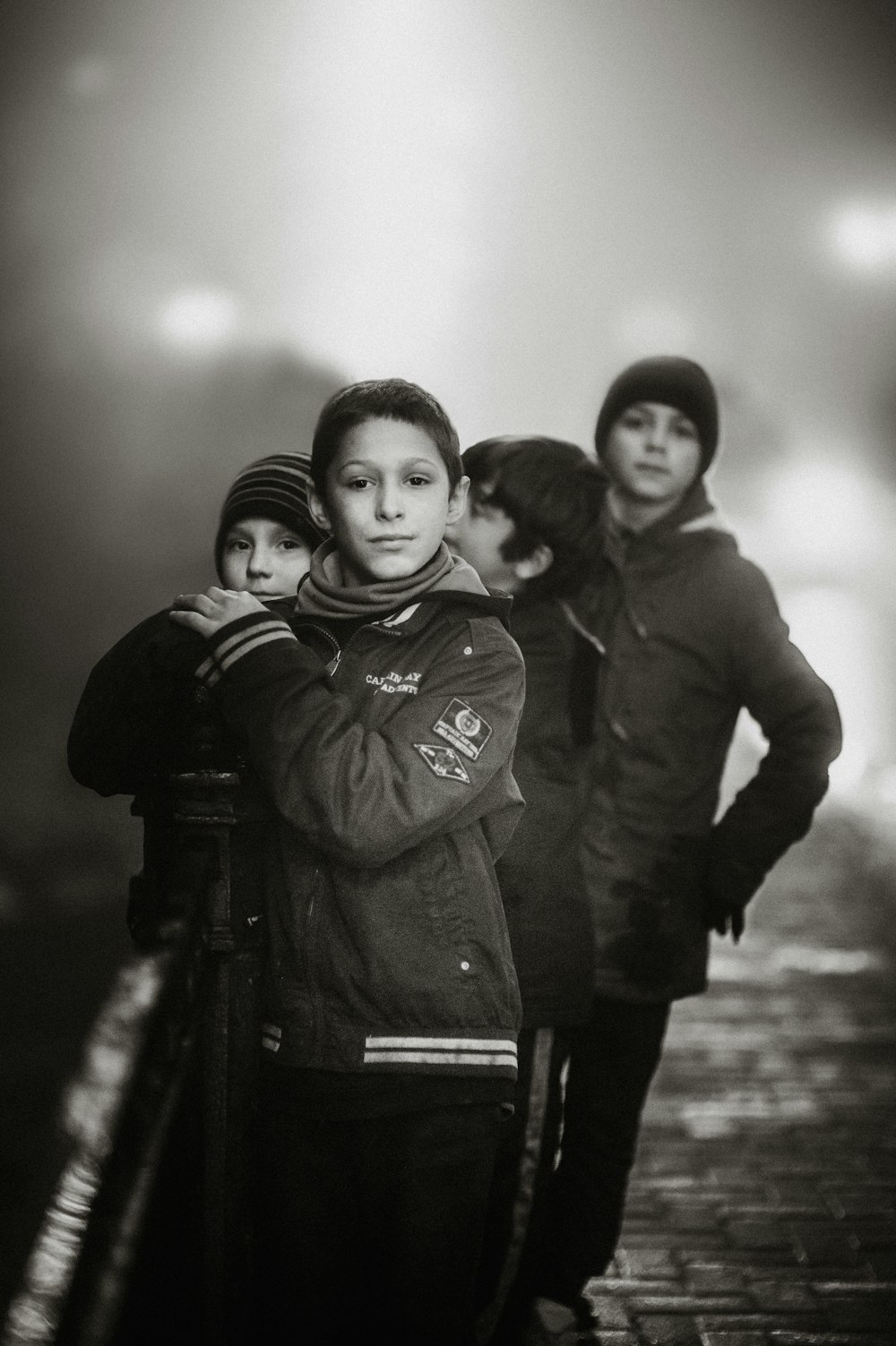 a black and white photo of a group of children