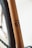 Close-up of a bicycle frame, highlighting details like the model number '53' and descriptors such as 'FabricBike Europe' and 'Hi-Ten Steel 700 Tig Welded'. The frame has a smooth, metallic finish with a minimalist design.