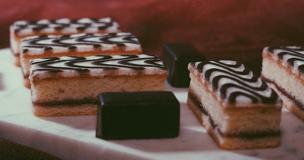 a close up of a tray of desserts on a table