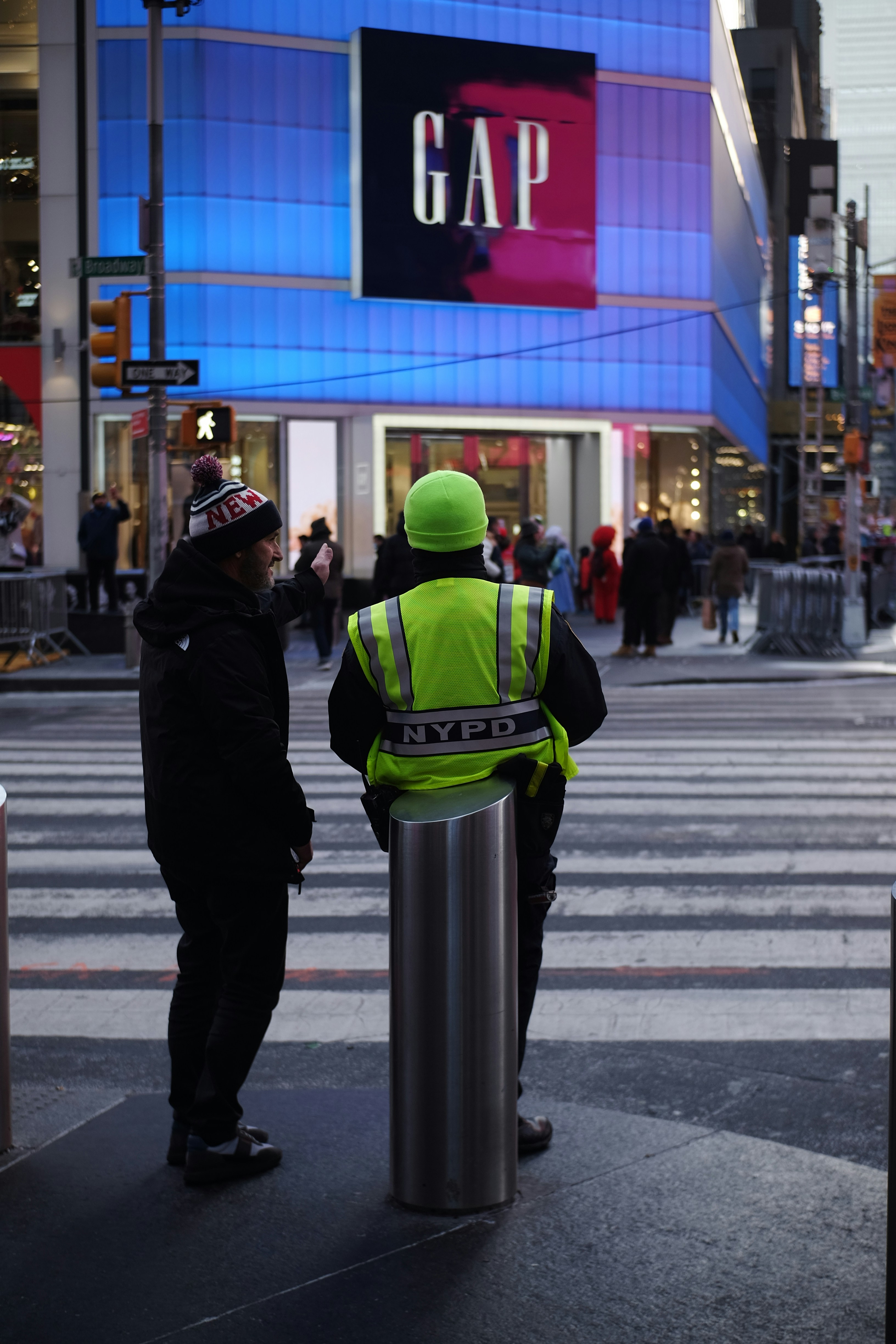 a couple of people that are standing in the street