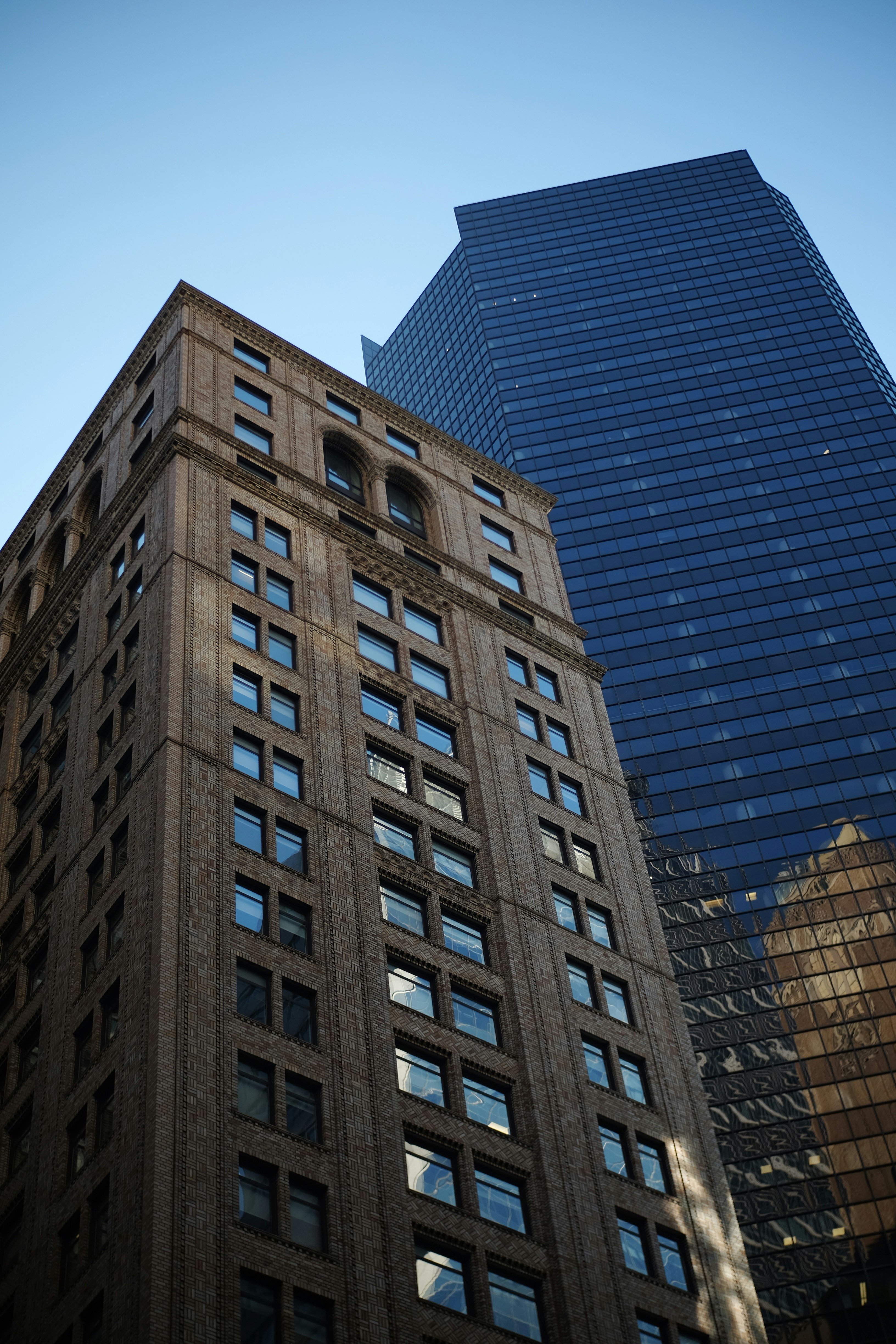 a tall building next to another tall building