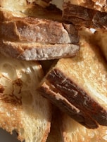 Sliced sourdough bread showing its airy texture and crisp crust.