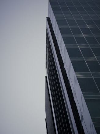 a very tall building with a sky in the background