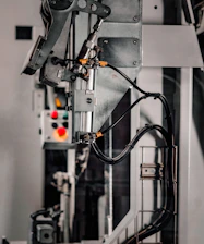 a close up of a machine with wires attached to it