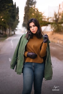 Cozy oversized sweater draping perfectly on a confident woman standing outdoors.