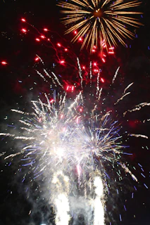 Colorful free spins bonus round with animated fireworks in the background