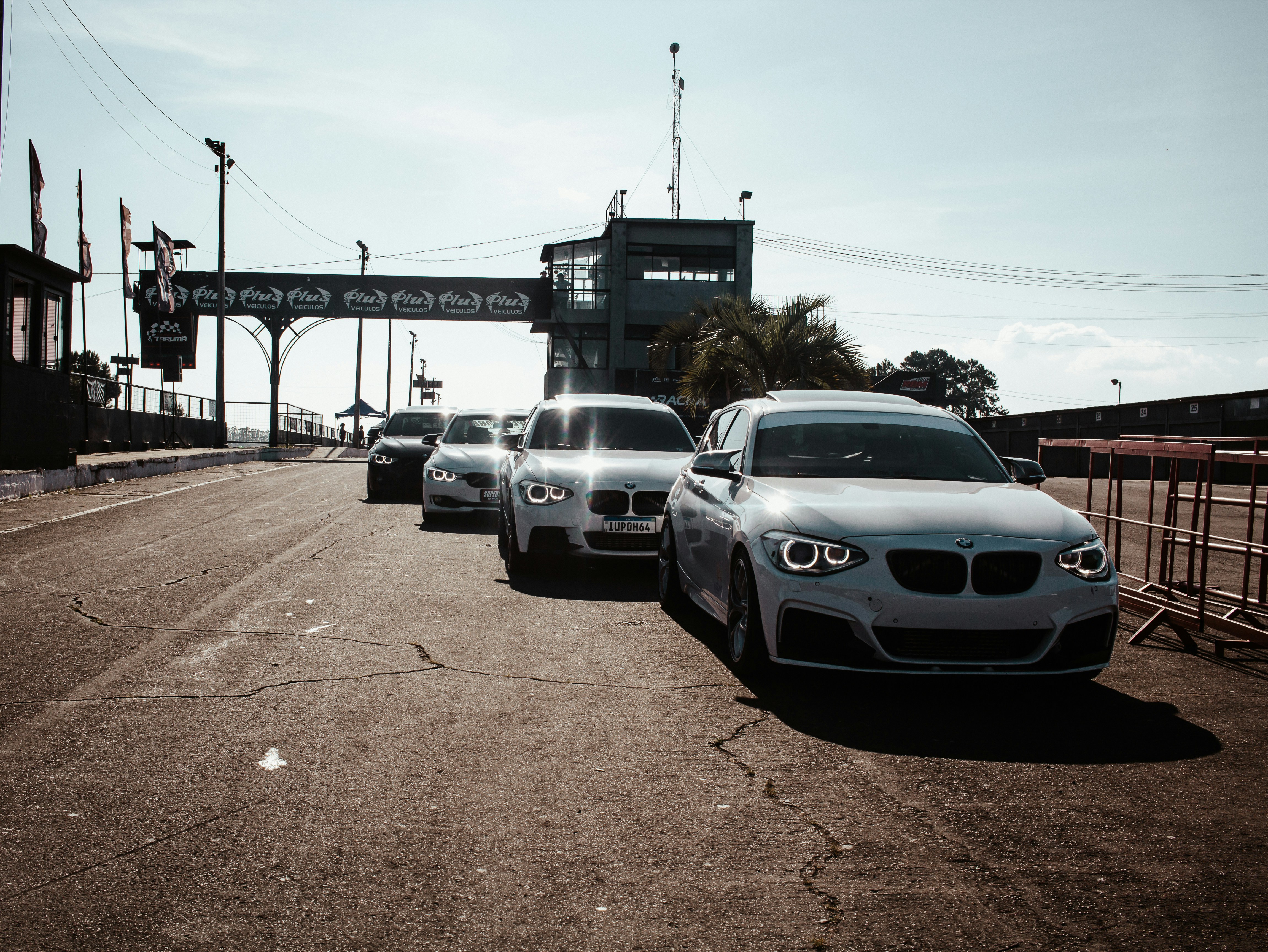 a group of cars parked on the side of a road