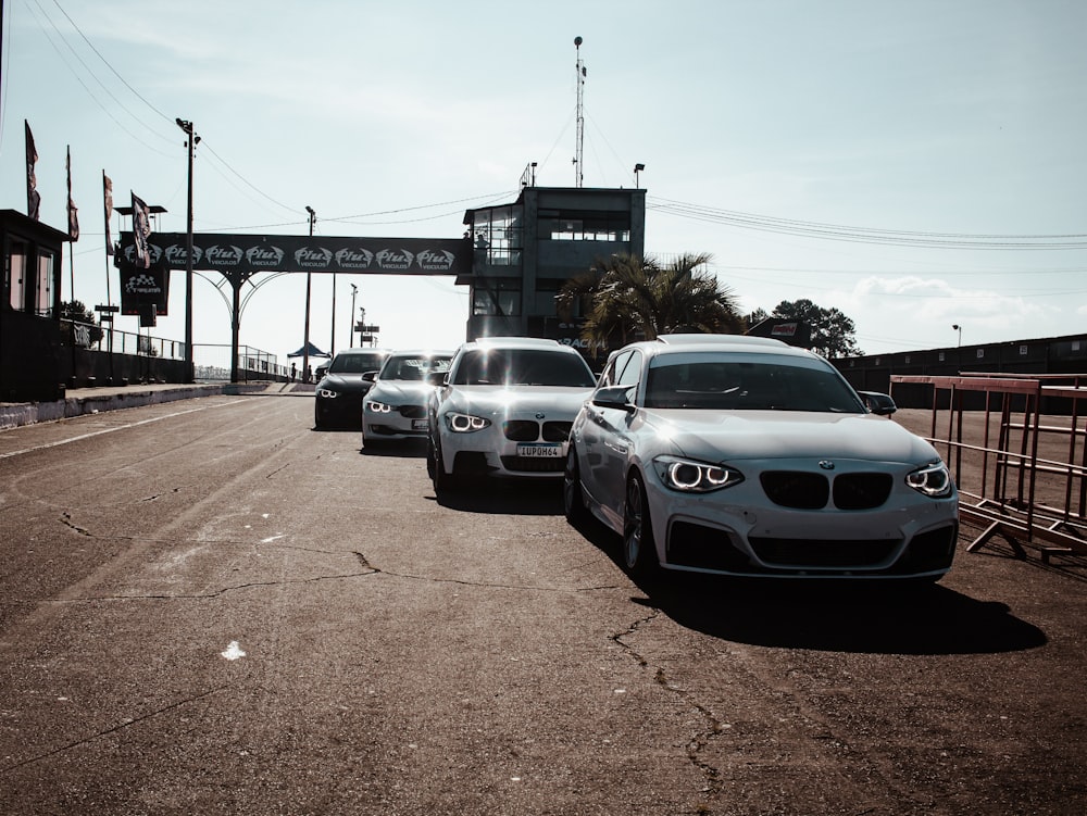 a group of cars parked on the side of a road