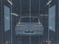 A white car displayed behind a glass panel covered in a matrix of small, bright LED lights creating a futuristic ambiance. The car's rear lights are distinctly visible, surrounded by a dark background that emphasizes the glowing pattern.