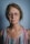 an older woman with glasses looking at the camera