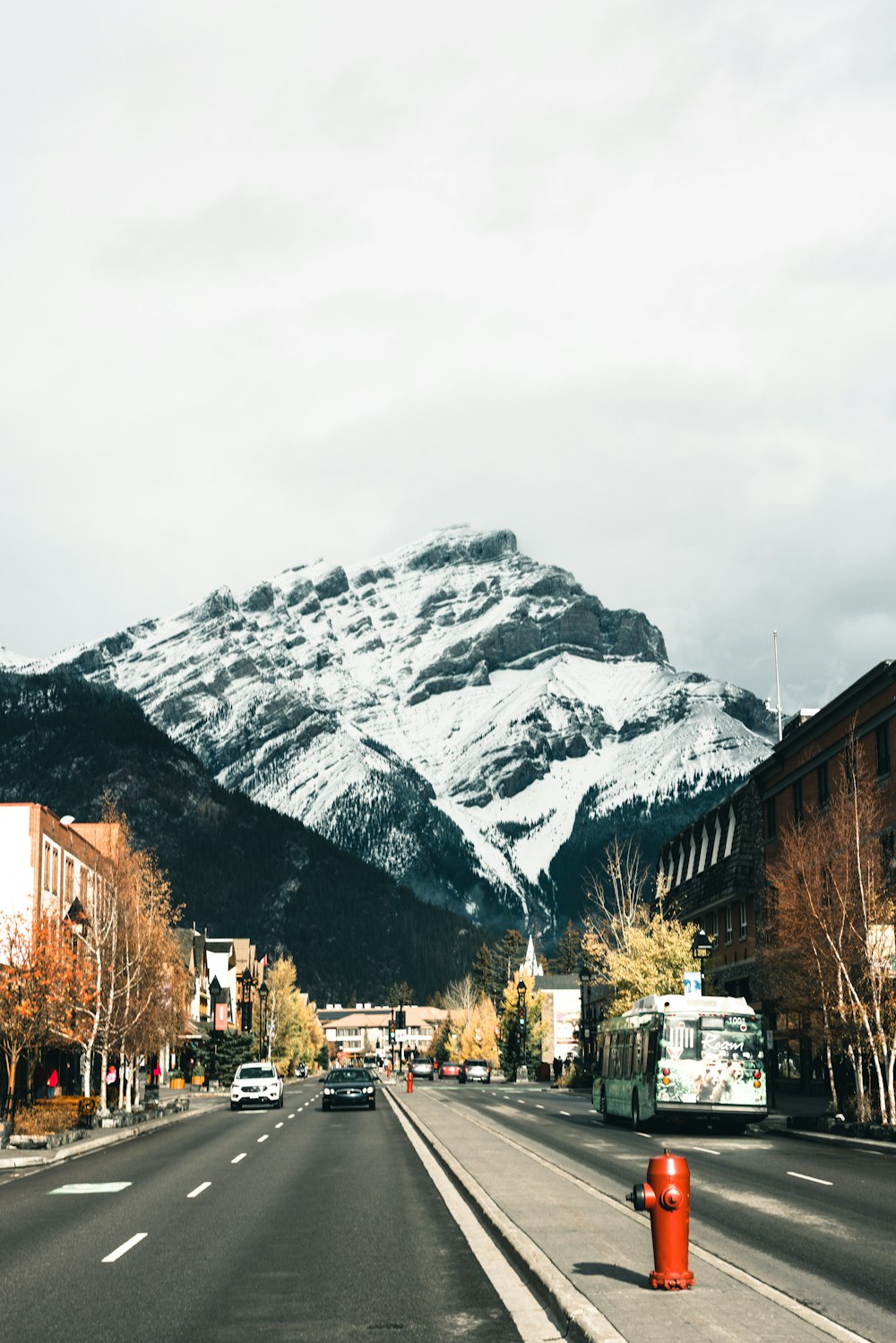 a street with a mountain in the background