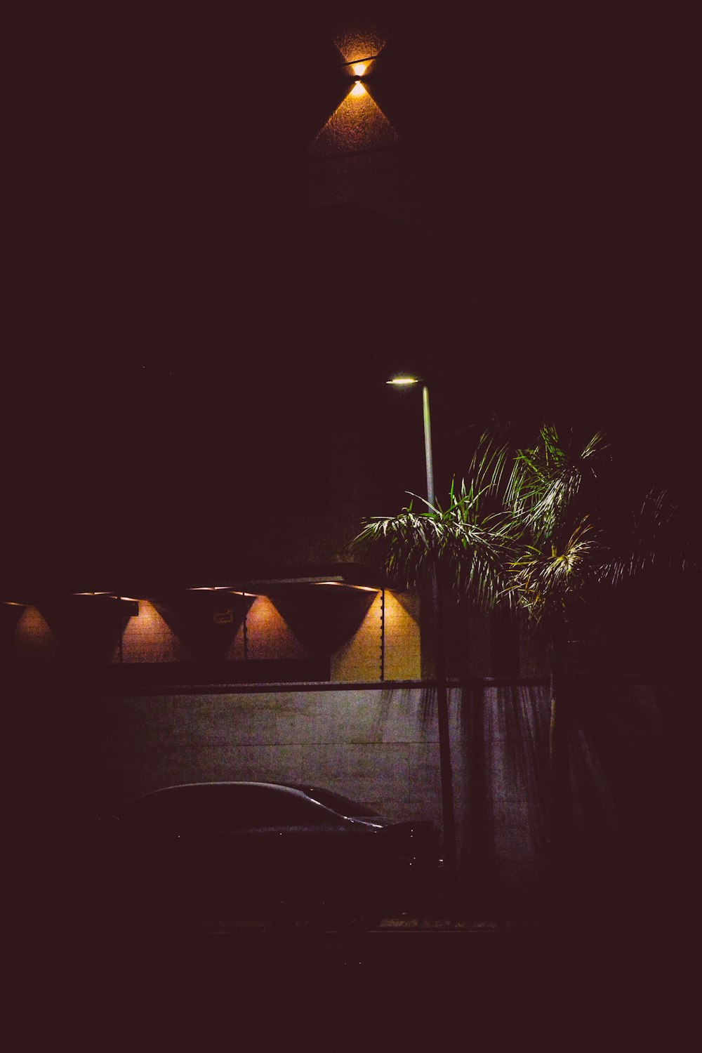 a street light is lit up in the dark