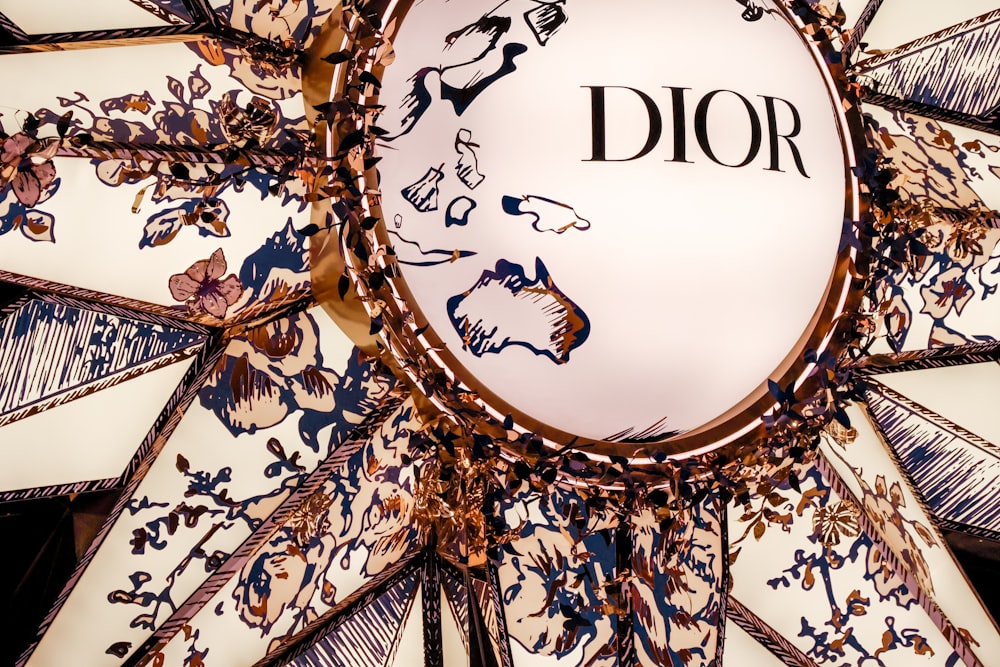 a close up of a decorative object with the word dior on it