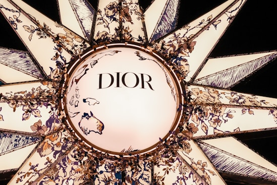 a chandelier with the word dior on it