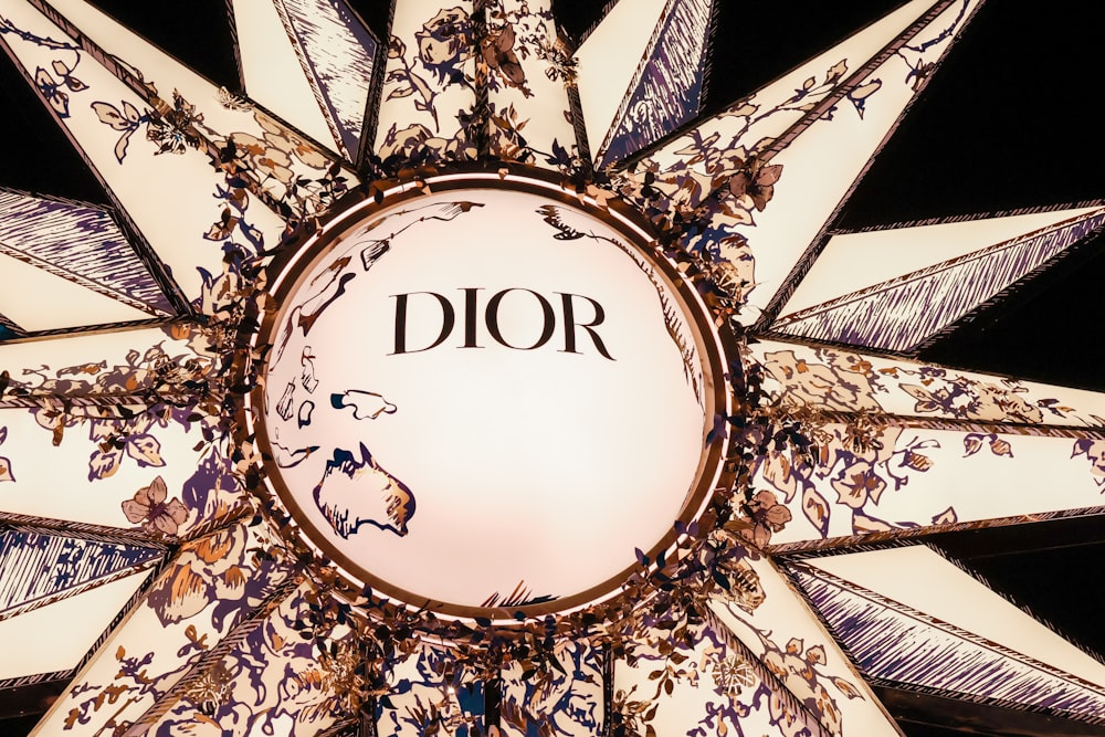 a chandelier with the word dior on it