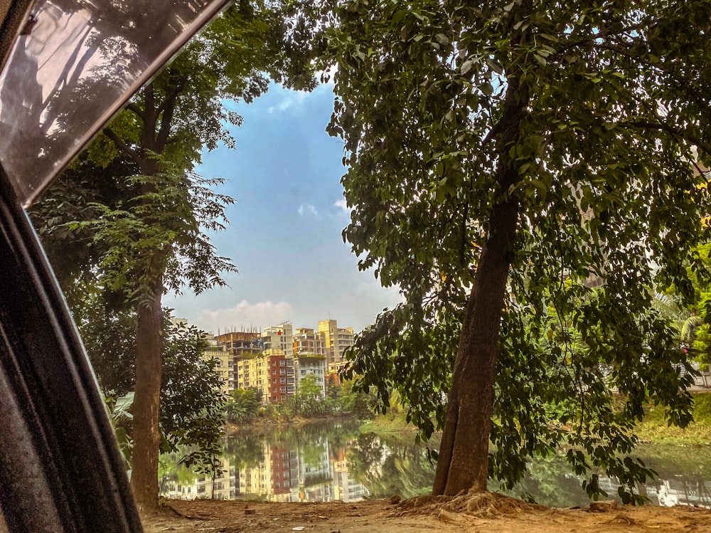 a view from inside a vehicle looking at a lake