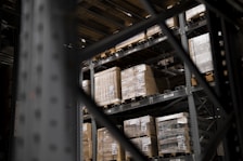 a warehouse filled with lots of boxes and pallets