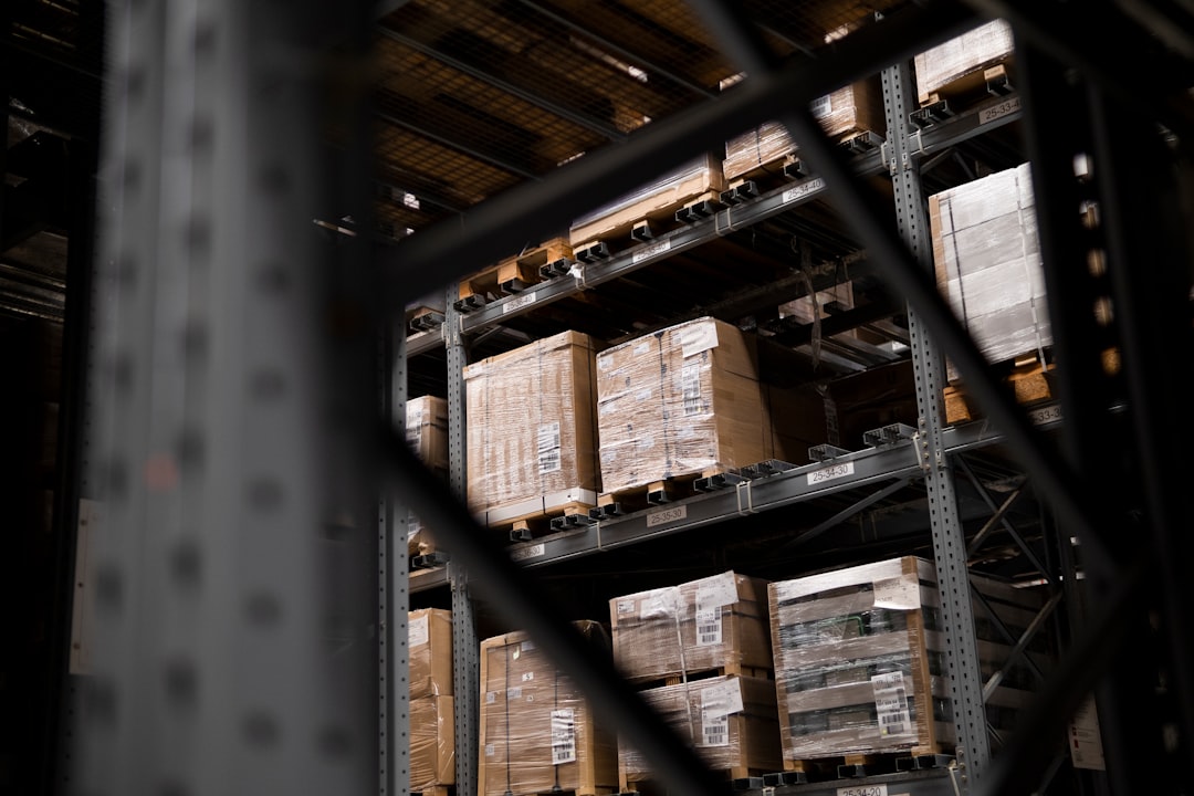 a warehouse filled with lots of boxes and pallets,