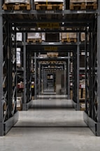 Photo of a professional industrial shelving setup in a bright warehouse.
