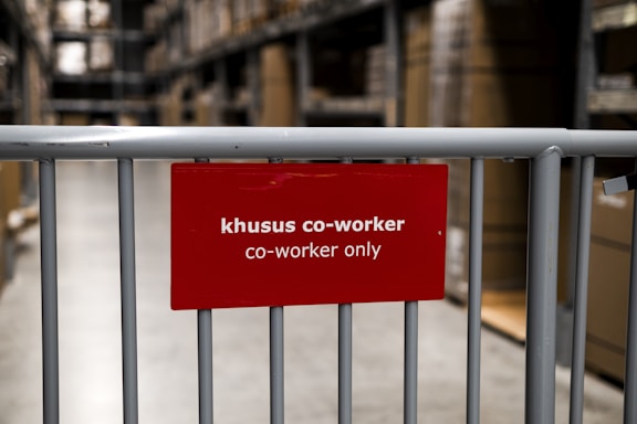 A professional office environment with safety signage.