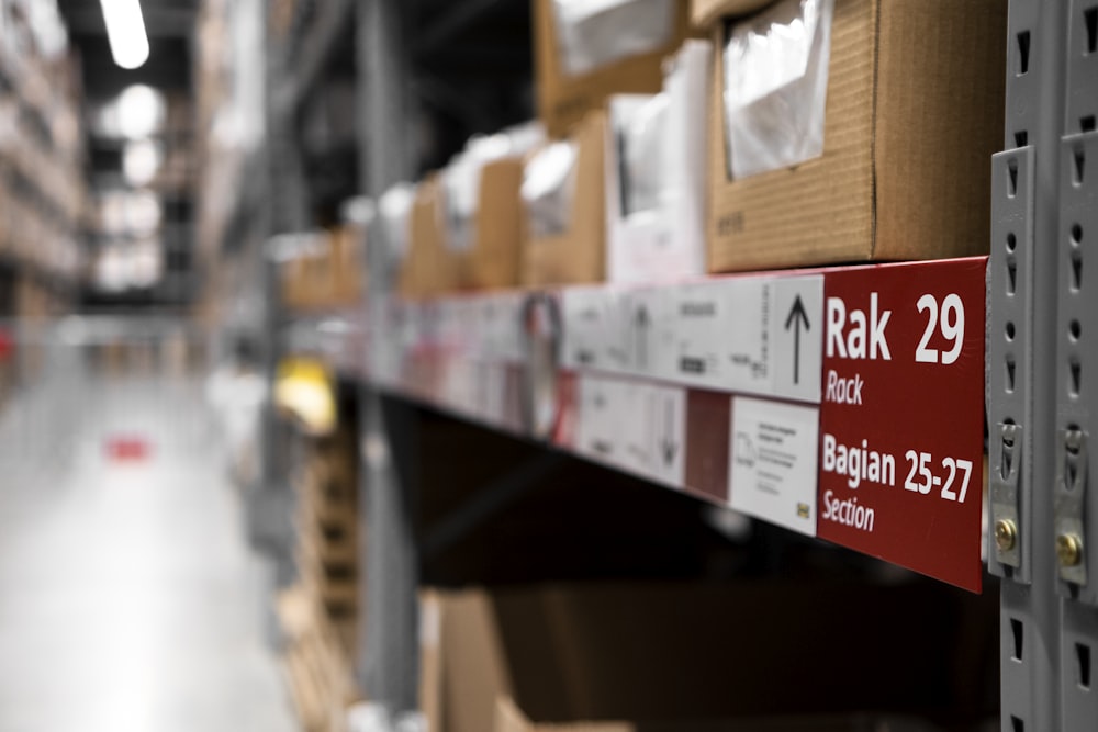 a rack of boxes in a large warehouse