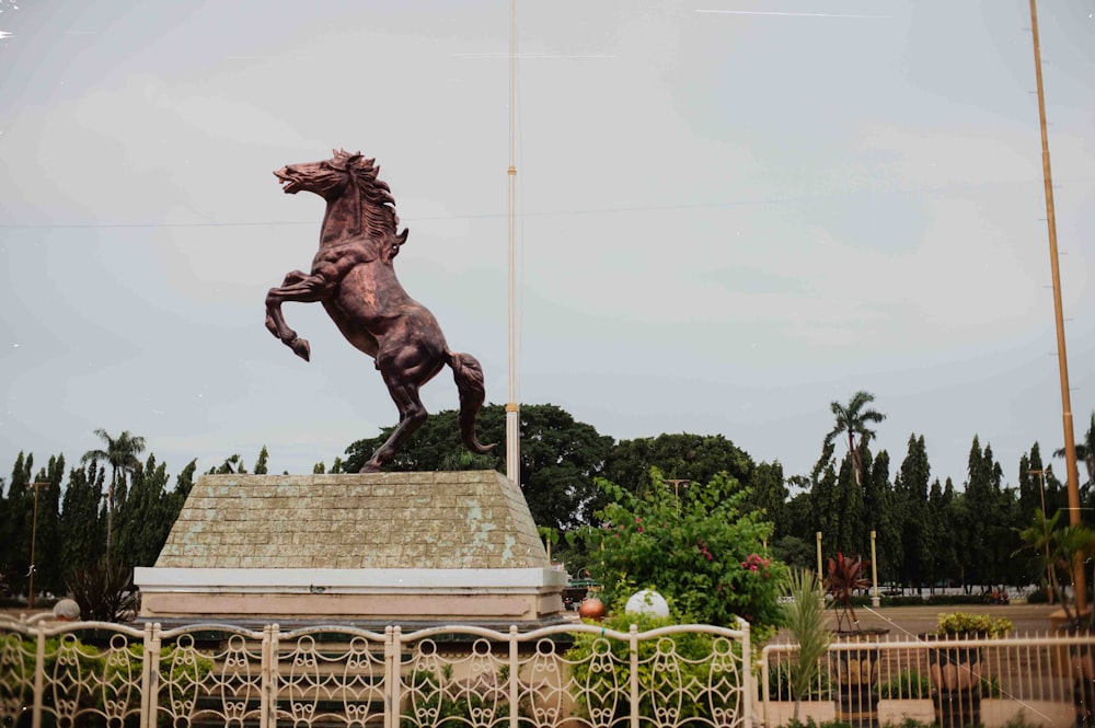 a statue of a horse standing on its hind legs