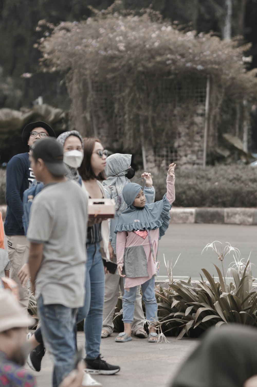 a group of people standing next to each other