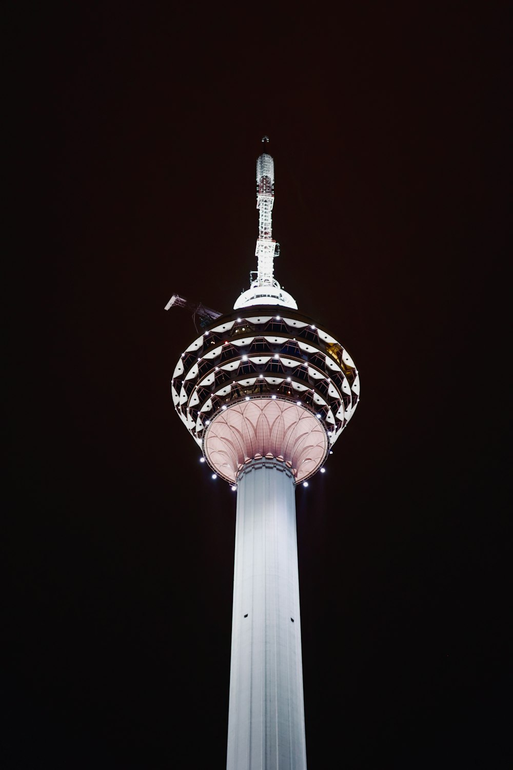 a tall tower with a clock on the top of it