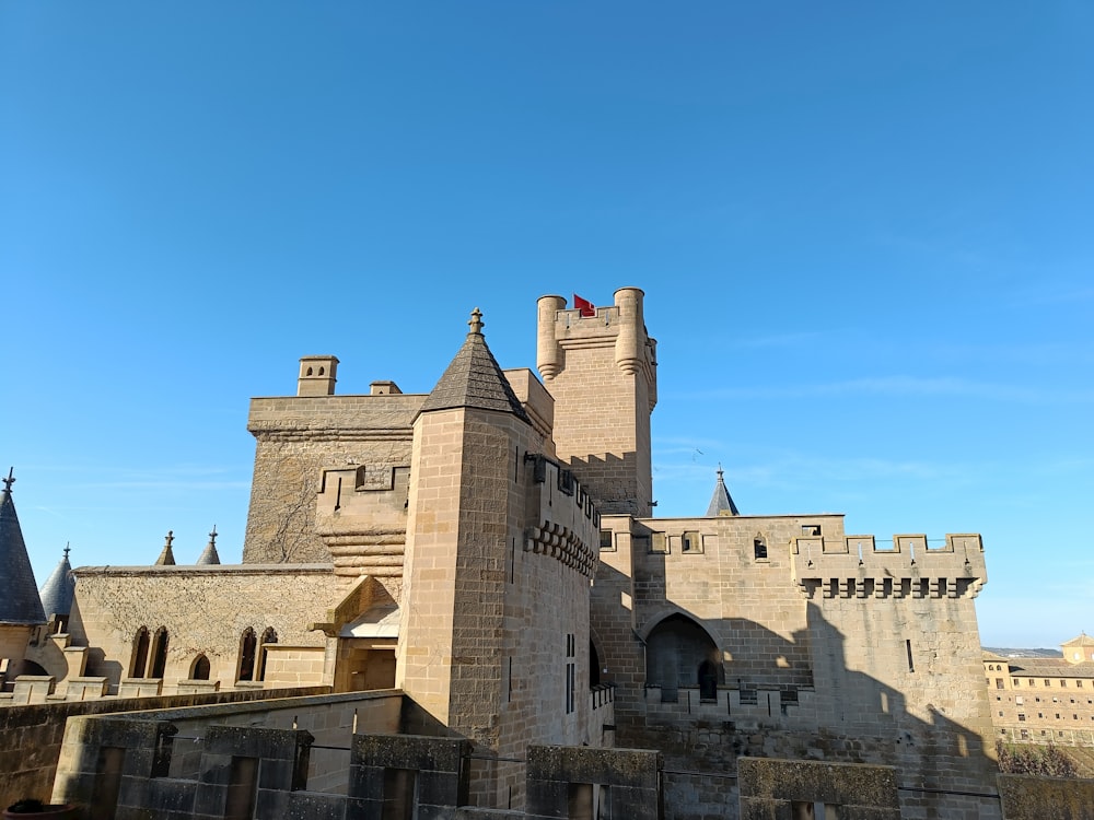 a castle with a clock tower on the top of it